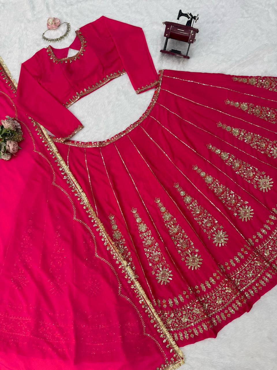 Radiant Rani Pink Silk Lehenga Choli Adorned with Opulent Heritage Floral Motifs and Intricate Zari Borders